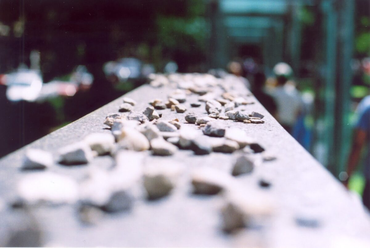 close up shot of small stones on a monument