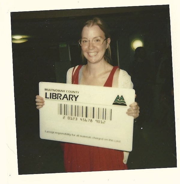 katie haegele with giant library card