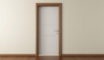 door with wood frame against white wall
