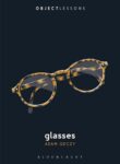 cover of Glasses by Adam Geczy, a pair of tortoiseshell glasses at center