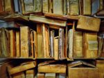 A stack of cardboard boxes on shelves